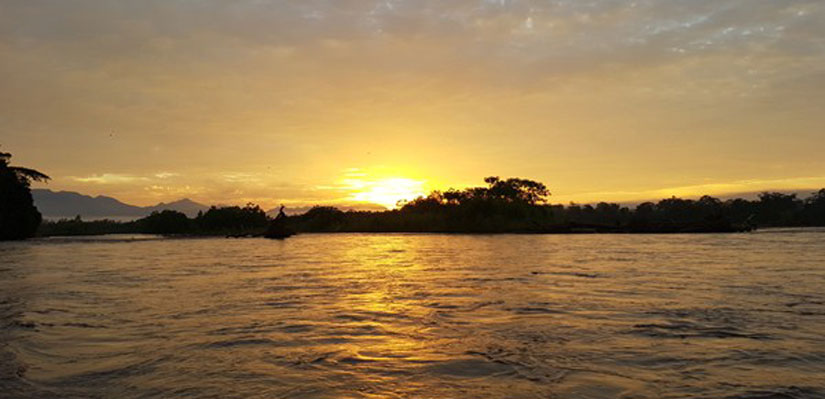 Sunset image in a boat in the Beni river