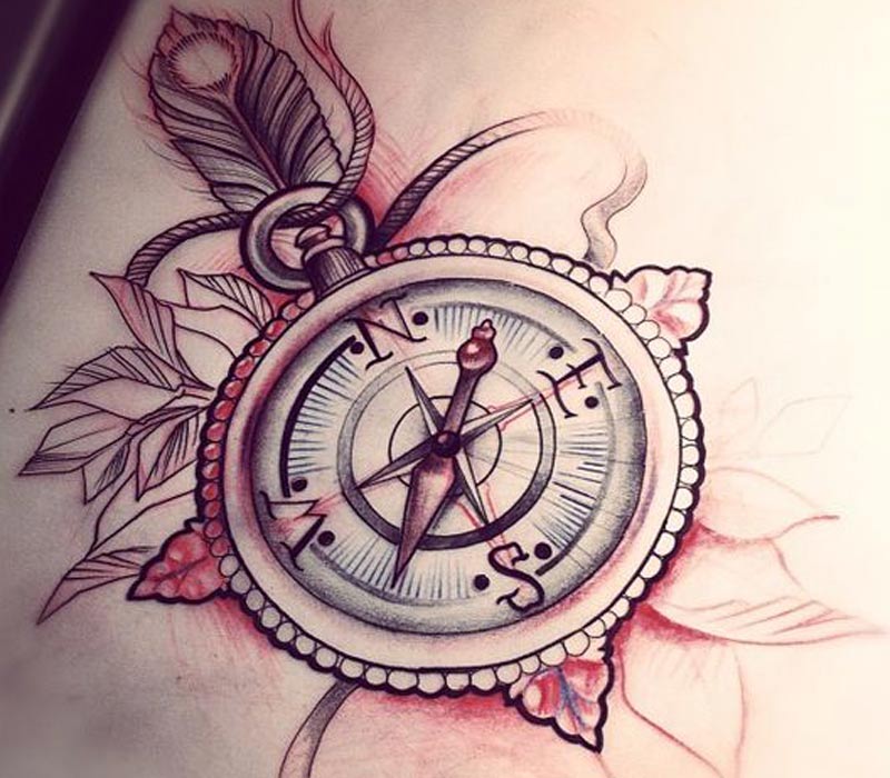 compass tattoo on the arm