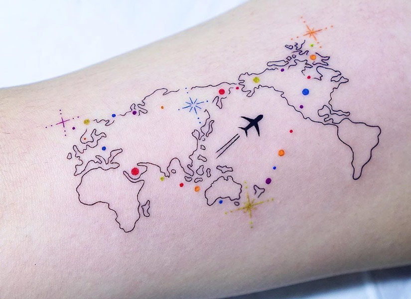 travel tattoo of the world with colored points