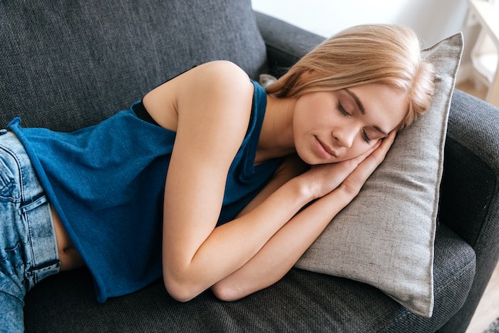 Girl sleeping in a couch