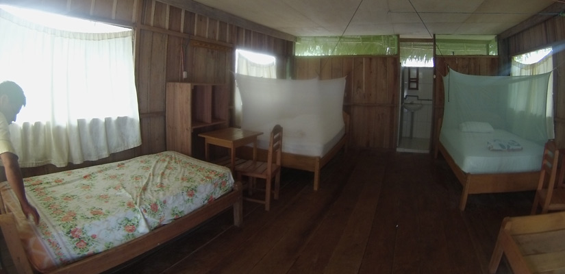 beds in a room in Iquitos jungle