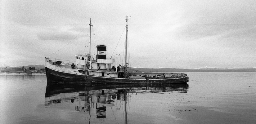 ship in black and white sea ushuaia