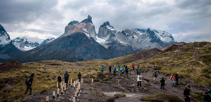 people at cuernos del paine viewpoint