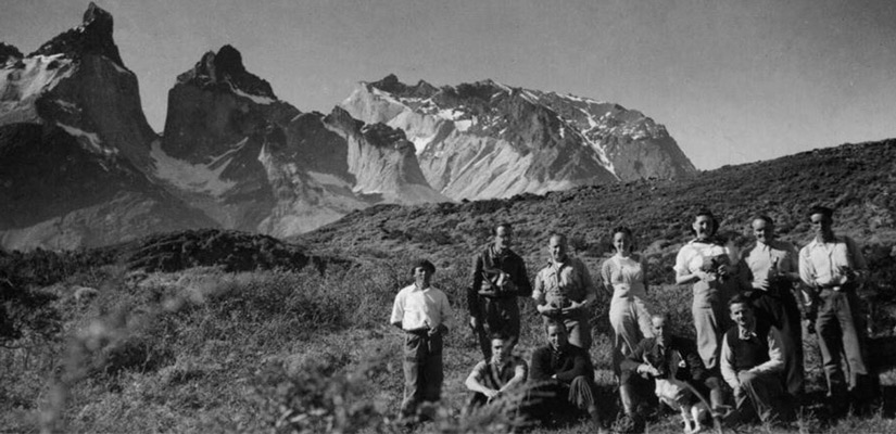 travelers in black and white in 90s in torres paine