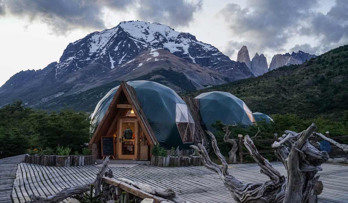refuge in torres del paine with mountains in the back