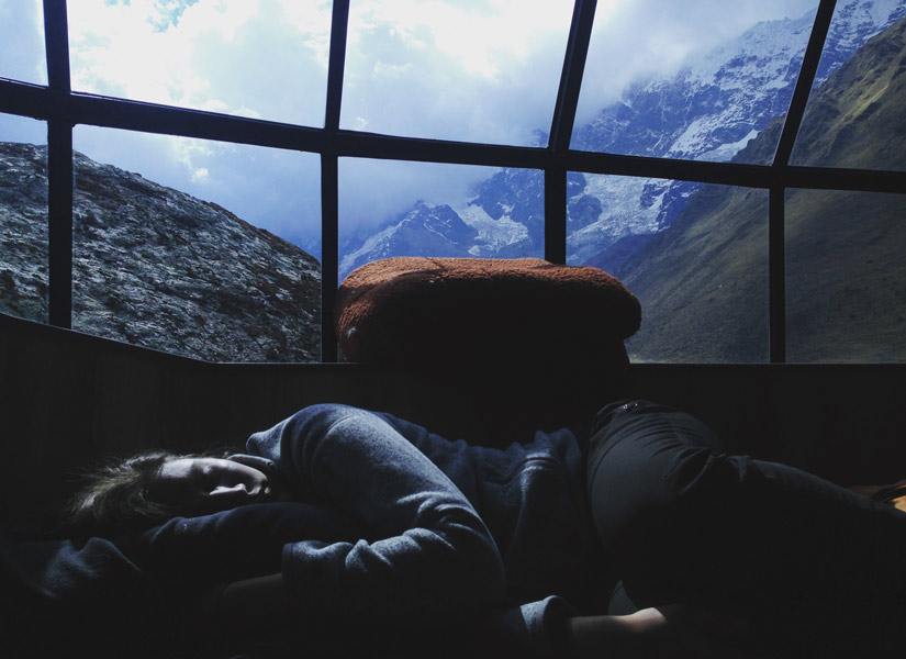 person sleeping in igloo in salkantay trekking