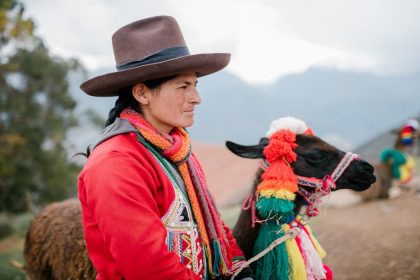 Indigenous woman with a llama