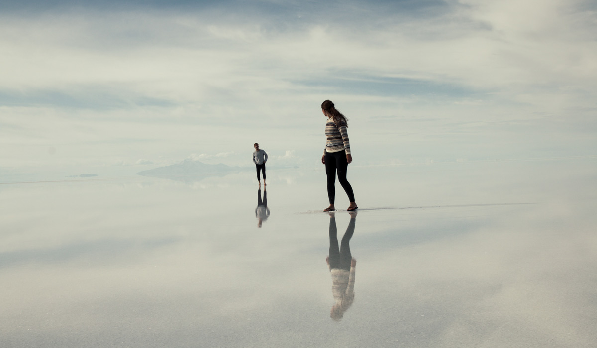 mirror effect in the Uyuni Salt Flat on a 2 week itinerary through bolivia