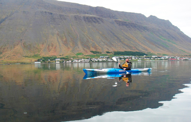 Person kayaking in Ísafjörður